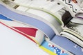 Stack of magazines on white background