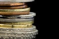 Stack of Malaysian Coins over Black Background