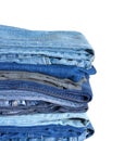 Stack on many jeans isolated on white close-up Royalty Free Stock Photo