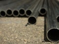 Stack of Many Pipes at the Construction Site Royalty Free Stock Photo