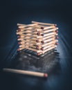 Stack of matches with a single match Royalty Free Stock Photo