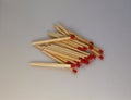 A stack of matches with a white background