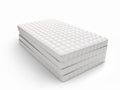 Stack of mattresses isolated on white background