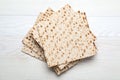 Stack of matzos on white wooden table, top view Royalty Free Stock Photo