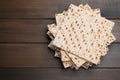 Stack of matzos on wooden table, top view. Space for text Royalty Free Stock Photo
