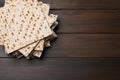 Stack of matzos on wooden table, top view. Space for text Royalty Free Stock Photo