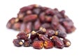 Stack of Mebrum dried dates fruits isolated on white background. Royalty Free Stock Photo