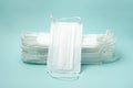 Stack of medical masks on the blue background Royalty Free Stock Photo