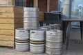 Stack of metal beer barrels outdoors