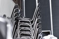 Stack of metal chairs prepare for event Royalty Free Stock Photo