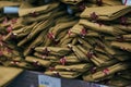 Stack of military caps of the Soviet army with red stars in supermarket. Garrison cap with a red stars. Red stars with Royalty Free Stock Photo