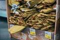 Stack of military caps of the Soviet army with red stars in supermarket. Garrison cap with a red stars. Red stars with Royalty Free Stock Photo