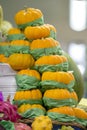 Stack of mini pumpkins on market stall