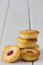Stack of Mini Raspberry and Lemon Cupcakes - Vertical Royalty Free Stock Photo