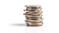 Stack of Mixed Metal Coins on a White Background money currency Royalty Free Stock Photo