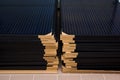 Stack of new solar panel ready for installation