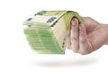 Stack of money in hand  on white background. 100 euro banknotes in a man& x27;s hand. A man holds out his hand Royalty Free Stock Photo