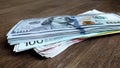 A stack of money is lying on the table. Close-up Royalty Free Stock Photo