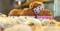 Stack of muffins arranged on tray at bakery Royalty Free Stock Photo