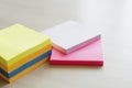 Stack of multi-colored stickers on the table. place for text, copyspace Royalty Free Stock Photo