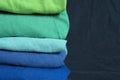 A stack of multicolored fabric in cool colors Royalty Free Stock Photo