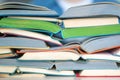 Stack of multicolored open books closeup, back to school concept Royalty Free Stock Photo