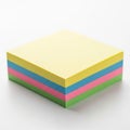 Stack of multicolored sticky notes on a white surface. The stack includes layers of Royalty Free Stock Photo