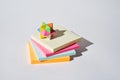 Stack of multicoloured paper stickers on a white background. Royalty Free Stock Photo