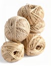 Stack of Natural Beige Yarn Balls on White Background with Subtle Shadows Royalty Free Stock Photo