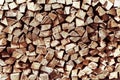 Stack of natural firewood in preparation for the winter and used for camp fires, fireplaces and home heating. Royalty Free Stock Photo