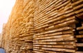 Stack of natural rough wooden boards. Wooden boards, lumber, industrial wood. Royalty Free Stock Photo