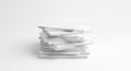 A stack of neatly arranged white paper sheets on a plain white background. The papers Royalty Free Stock Photo
