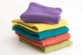 Stack of neatly folded colorful kitchen towels Royalty Free Stock Photo