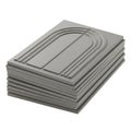 Stack of neatly folded gray fabric or paper sheets on a flat surface Royalty Free Stock Photo