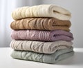Stack of neatly folded, soft cable-knit sweaters Royalty Free Stock Photo