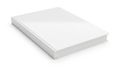 Stack of neatly folded white paper sheets placed on a flat surface Royalty Free Stock Photo