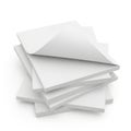 Stack of neatly folded white paper sheets on a plain background Royalty Free Stock Photo