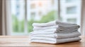 A stunning image of freshly washed white cotton bed sheets neatly folded. Clean surface in room. Bedding set Royalty Free Stock Photo