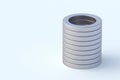 Stack of neodymium magnets on white background