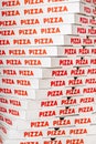 Stack of new cardboard pizza boxes Royalty Free Stock Photo