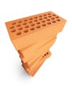Stack new red brick with a round holes. Royalty Free Stock Photo