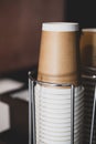 Stack of disposable brown coffee cup