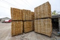 Stack of new wooden boards and studs at the lumber yard. Wooden Royalty Free Stock Photo