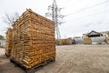 Stack of new wooden boards and studs at the lumber yard. Wooden Royalty Free Stock Photo