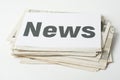 Stack of newspapers with inscription NEWS Royalty Free Stock Photo