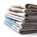 A stack of newspapers sitting on top of each other Royalty Free Stock Photo