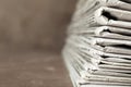 Stack of newspapers on table, closeup with space for text. Journalist`s work Royalty Free Stock Photo