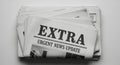 Stack of Newspapers with Urgent News Update Royalty Free Stock Photo