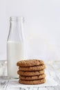 Stack of Oatmeal cookies with bottle of milk Royalty Free Stock Photo