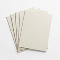 Stack of off-white blank paper sheets neatly arranged for use or display Royalty Free Stock Photo